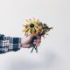 hand holding flowers