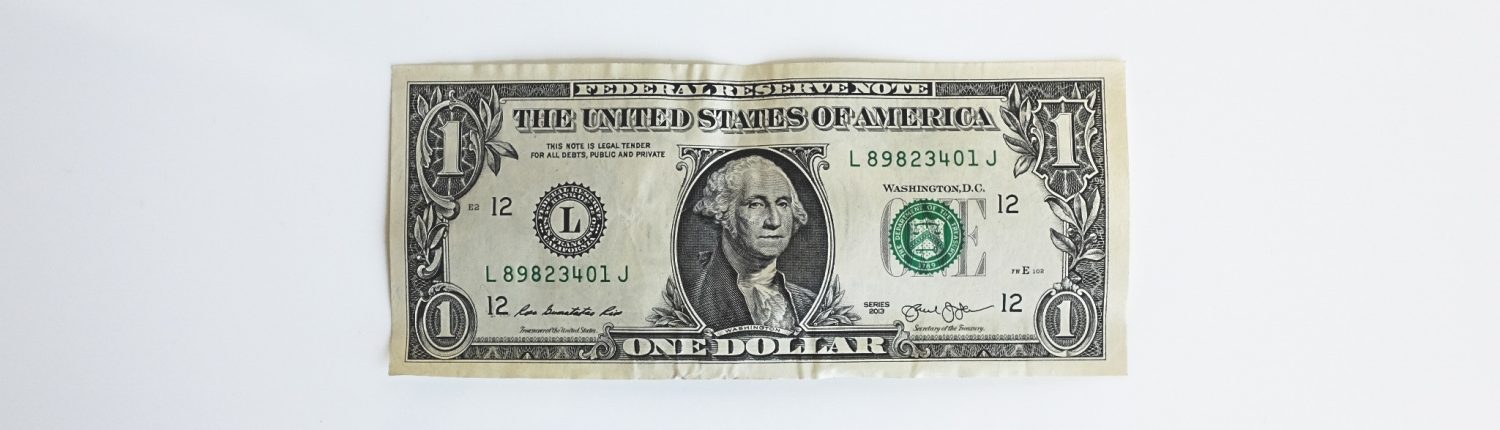 Dollar bill against white background