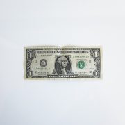 Dollar bill against white background