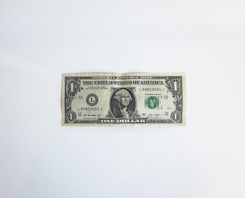 Dollar bill against white background