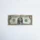 Dollar bill against white background