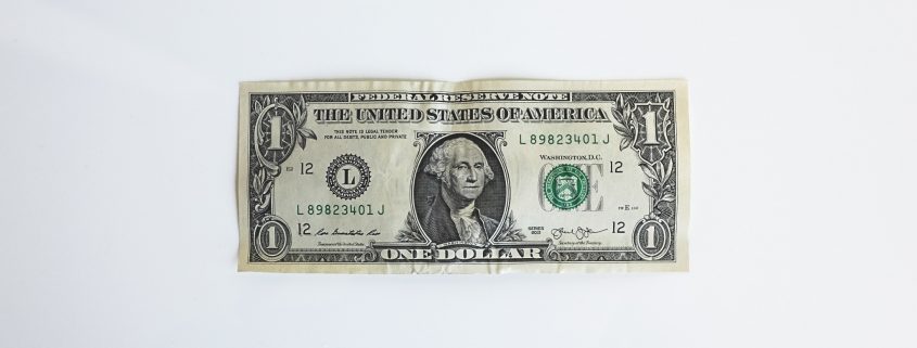 Dollar bill against white background