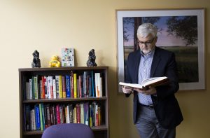 gordon fischer looking in book