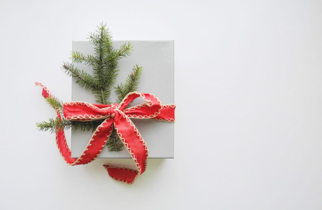 giving package with green spruce
