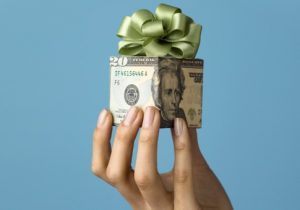 Money with bow on top