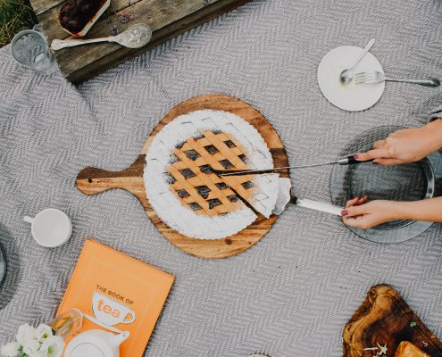 cutting into a pie