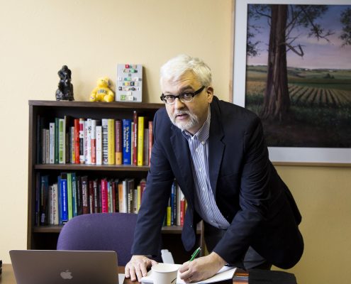 Gordon Fischer at desk