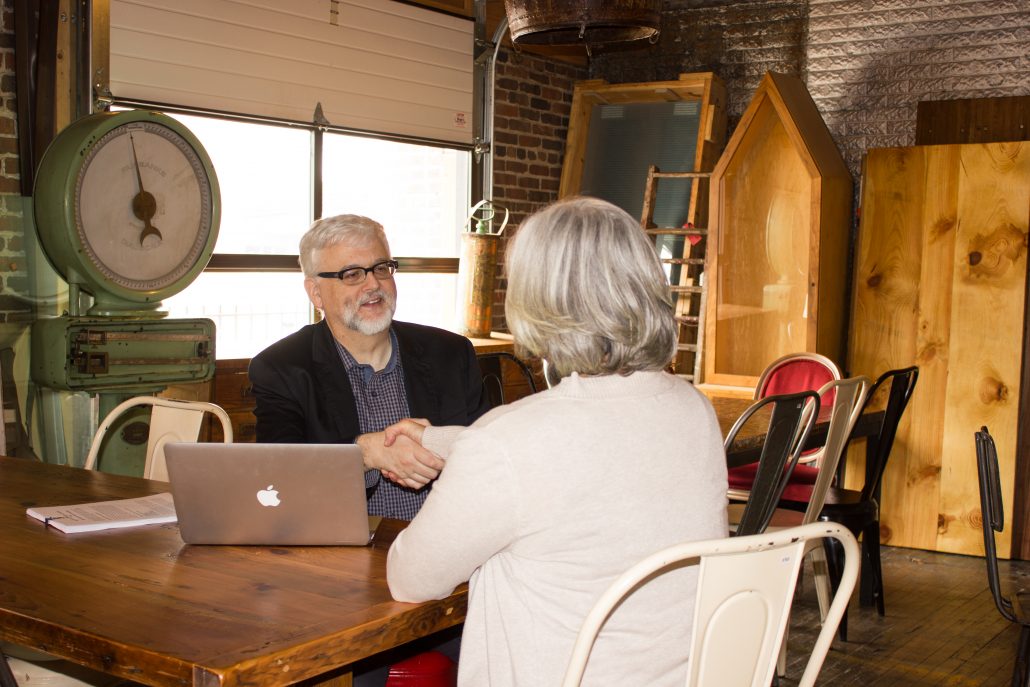 Gordon Fischer meeting with client