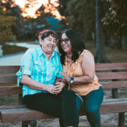 two women sitting on bench