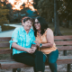 two women sitting on bench