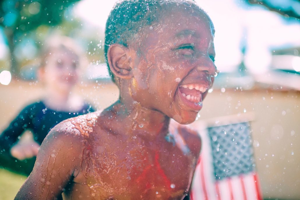 child celebrating fourth of july