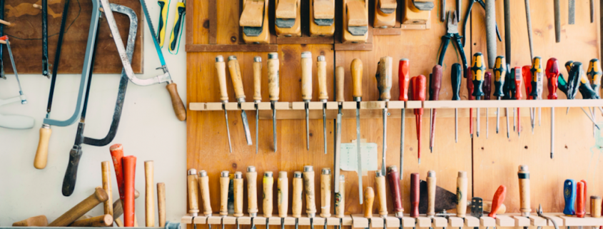 hammers and tools hanging in garage