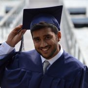 College student in graduation robes