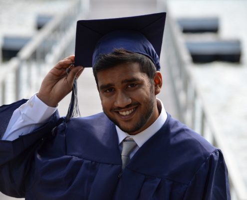 College student in graduation robes