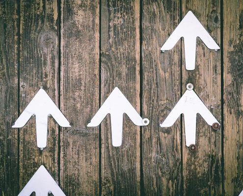 Arrows pointing up