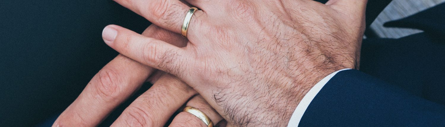 hands of 2 grooms