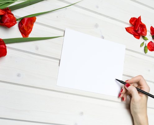 Person writing on paper