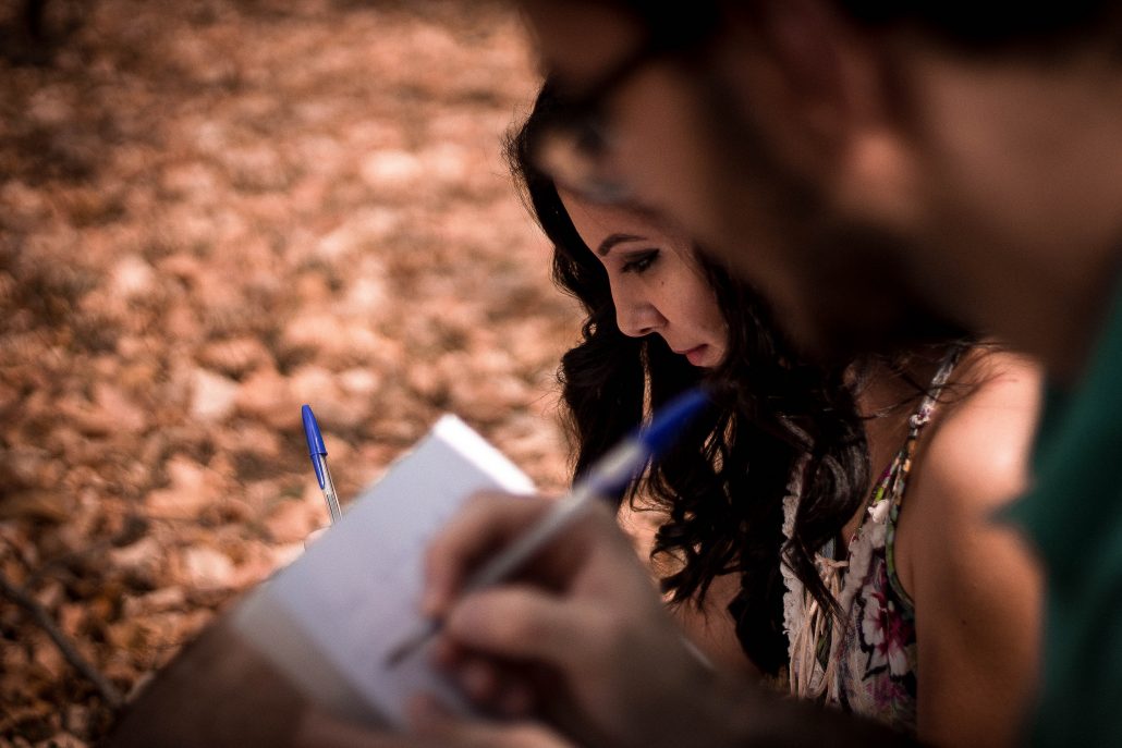 two people signing