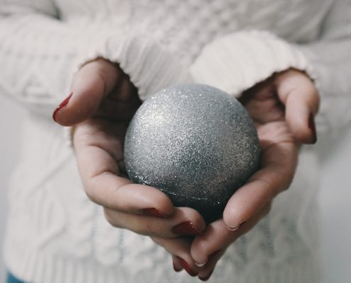 woman holding ornament