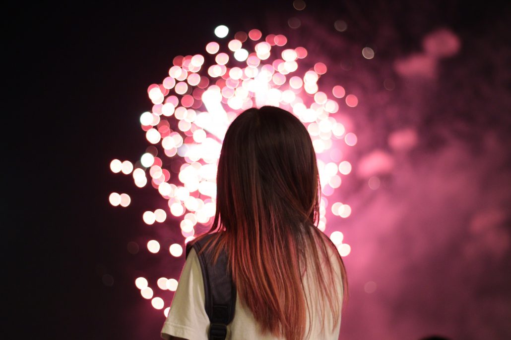 woman looking at fireworks