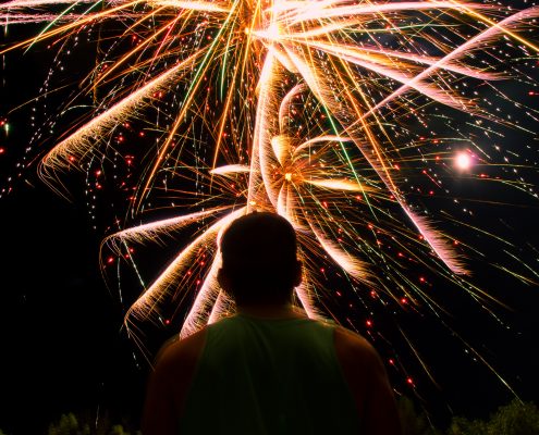 man with fireworks - charitable giving