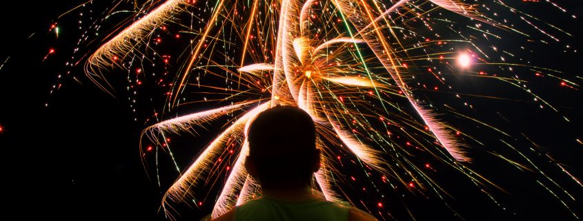 man with fireworks - charitable giving