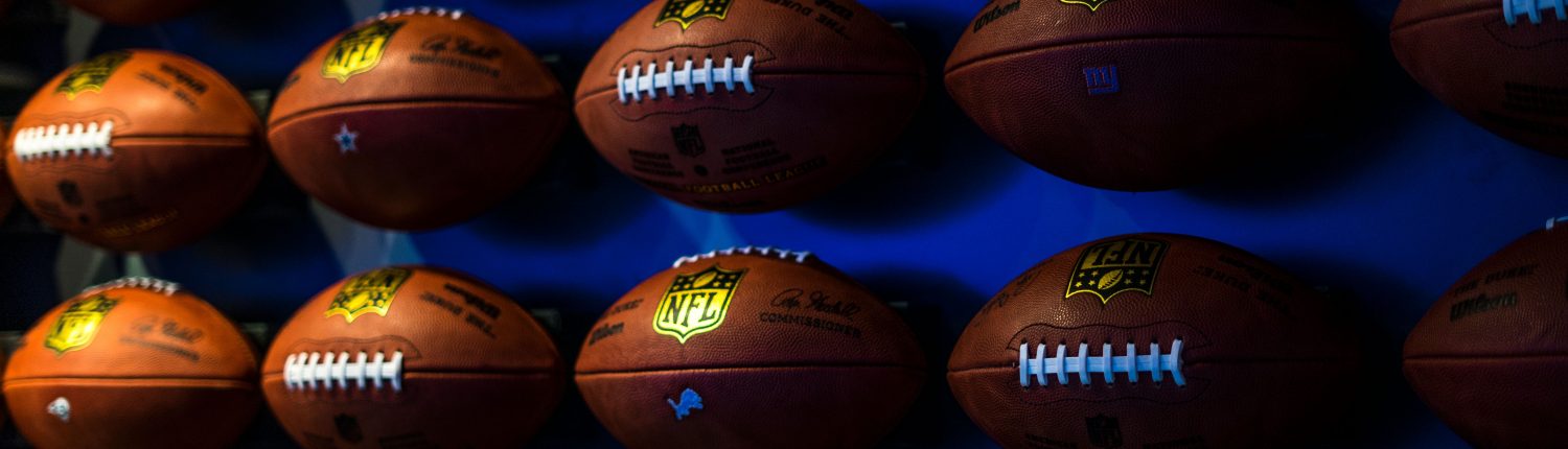 footballs on wall