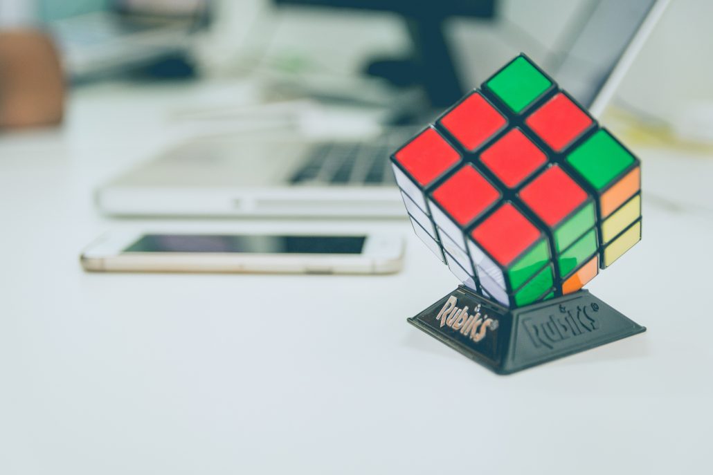 rubix cube on desk