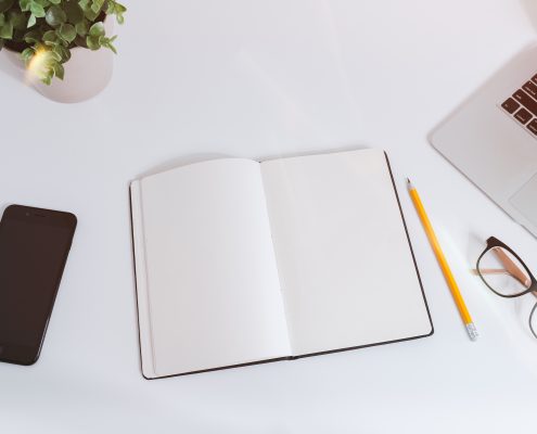 paper and phone on desk