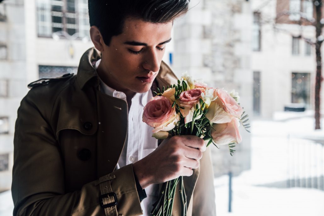 man with bouquet of roses