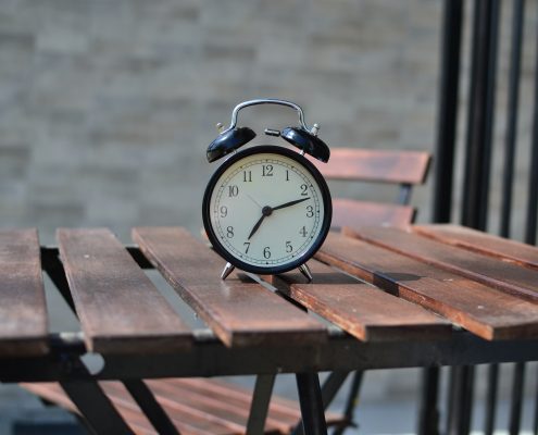 alarm clock on table