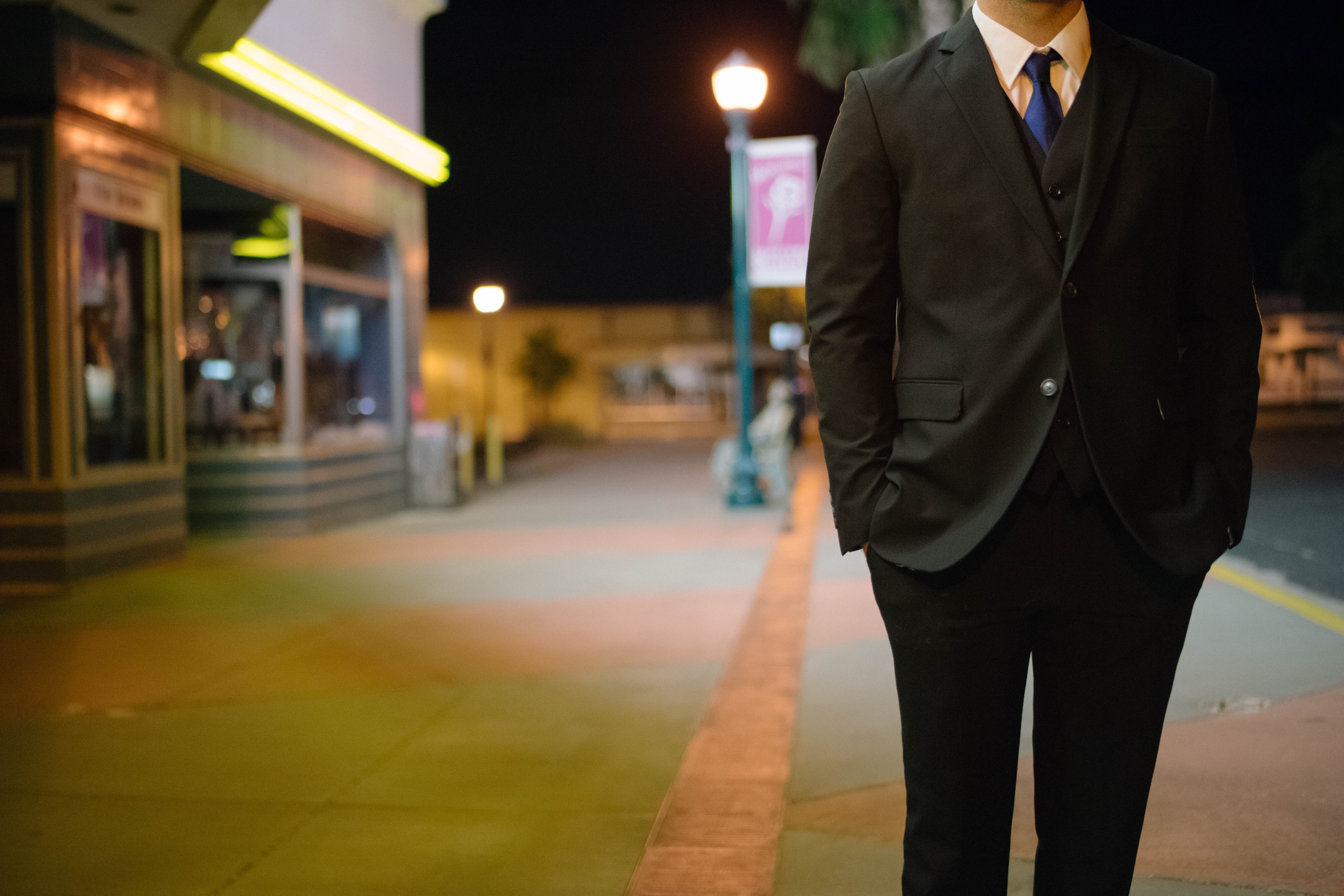 man standing on street