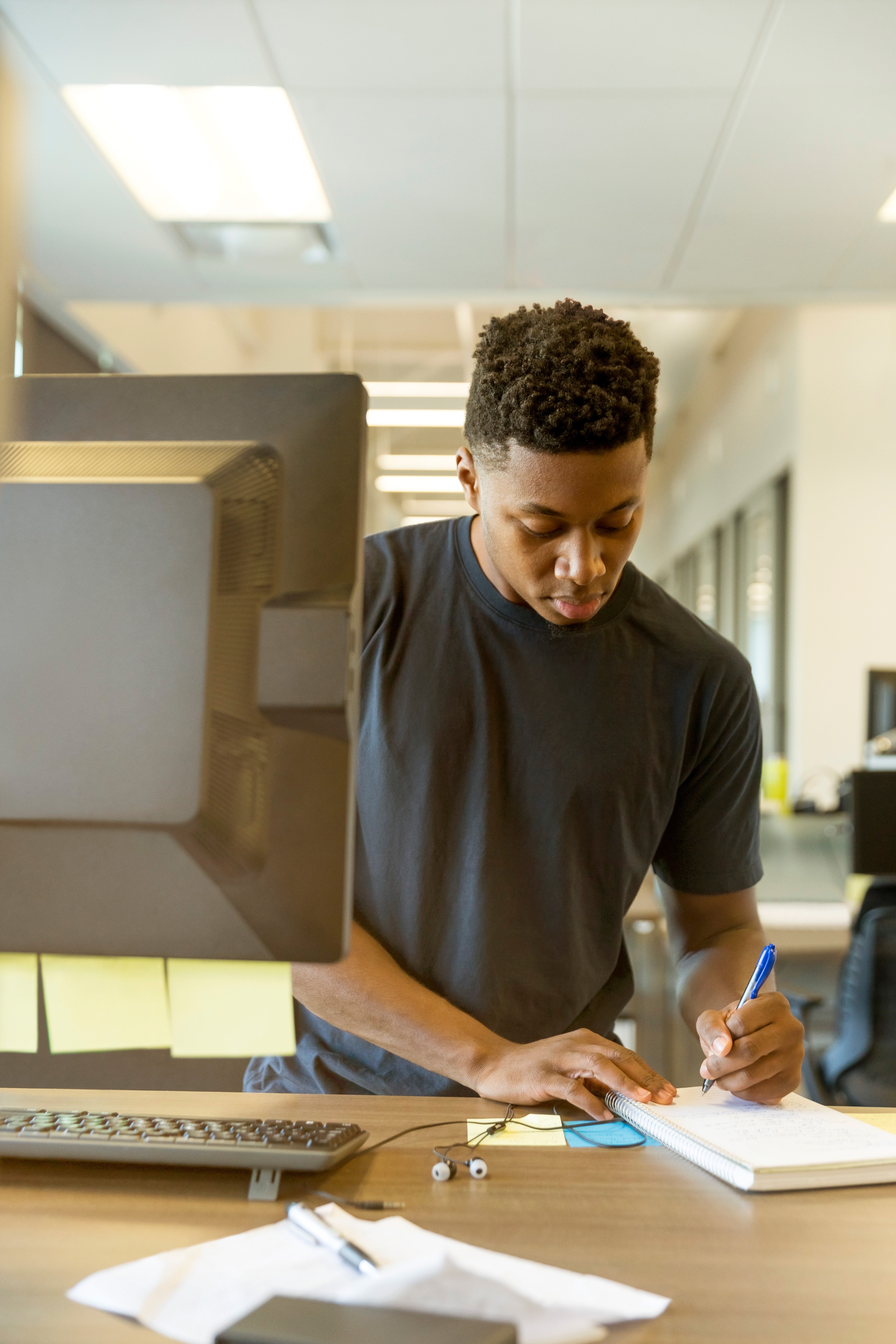 man at standing desk