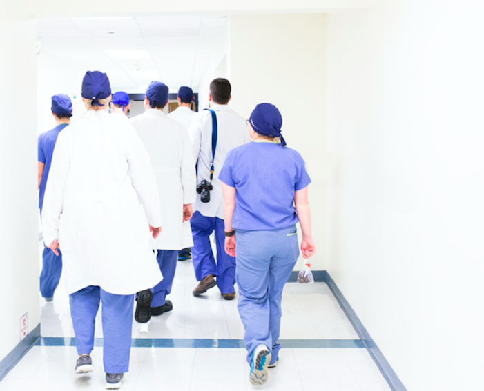 surgeons walking down hallway