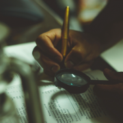 magnifying glass over book