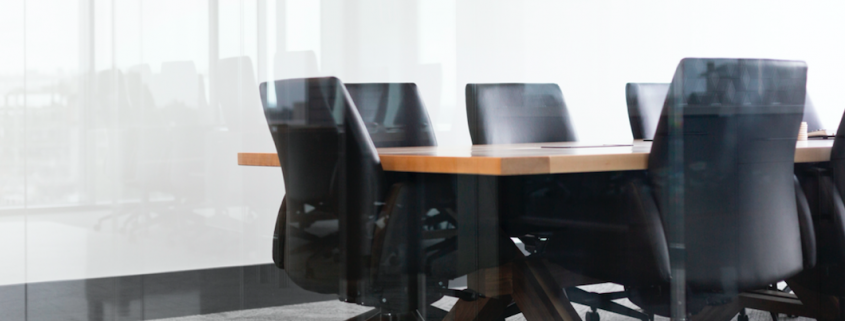 boardroom with large table and chairs