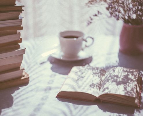 table with book and tea
