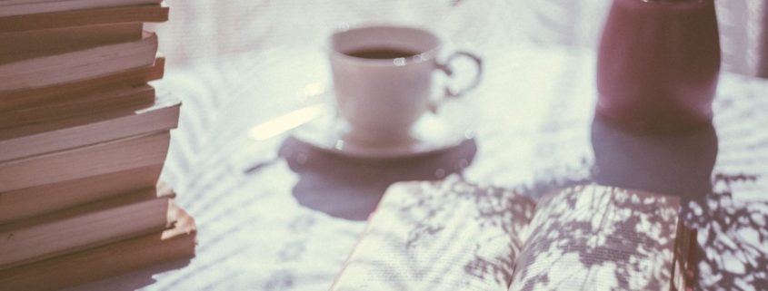 table with book and tea