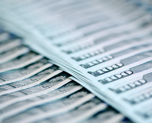 Rows of 100 dollar bills