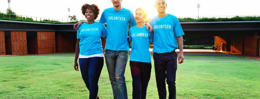 volunteers walking on grass