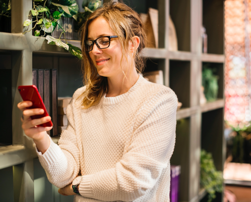 woman reading on phone