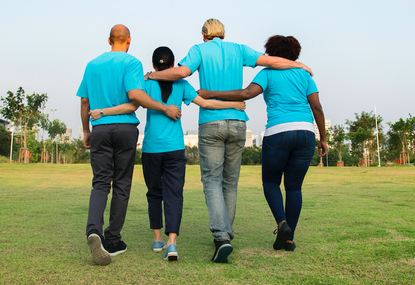 volunteers walking in field