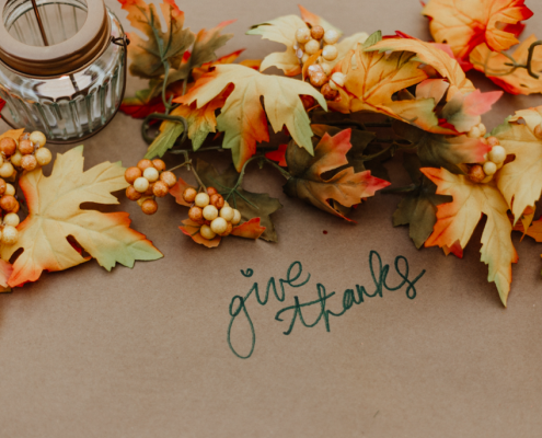 give thanks table with autumn leaves