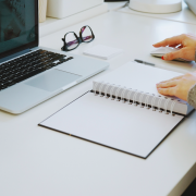 working on paper on desk