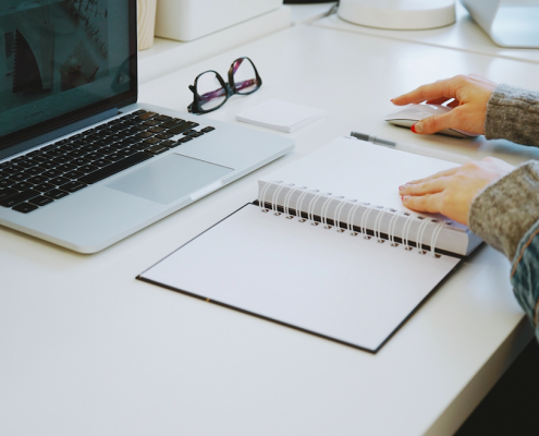 working on paper on desk