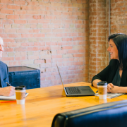 two people at board meeting