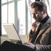 man questioning computer