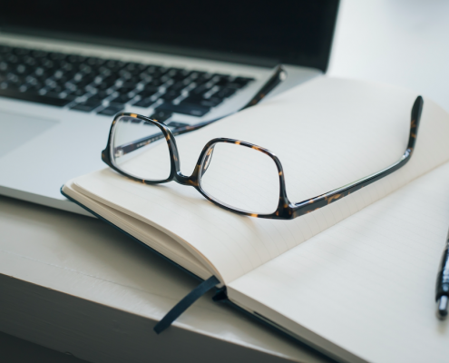 glasses on notebook