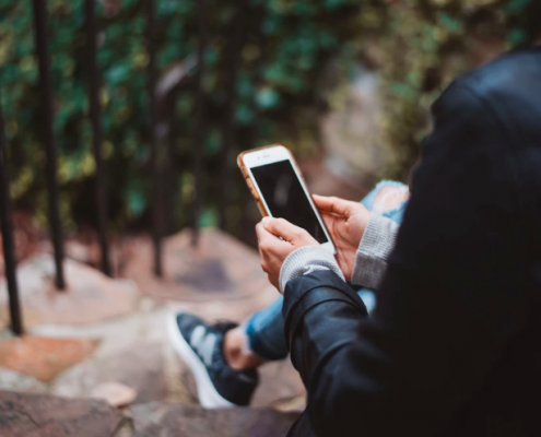 woman reading on phone