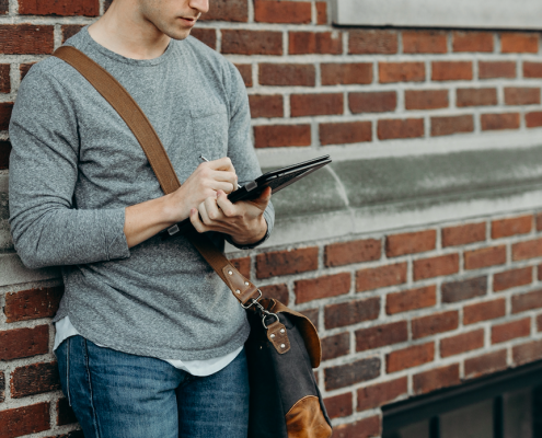 man reading on a tablet